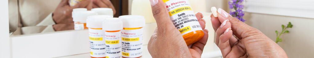 a woman checks: is her prescription valid?
