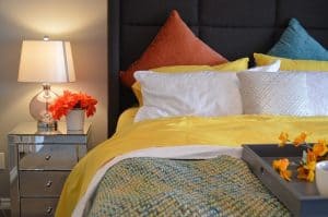 An image of a comfortable bed representing the relief of pain when sleeping in the correct bed.